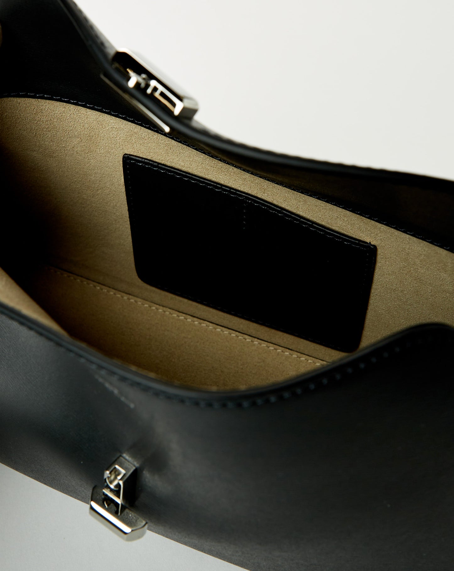 T-Lock Leather Clutch