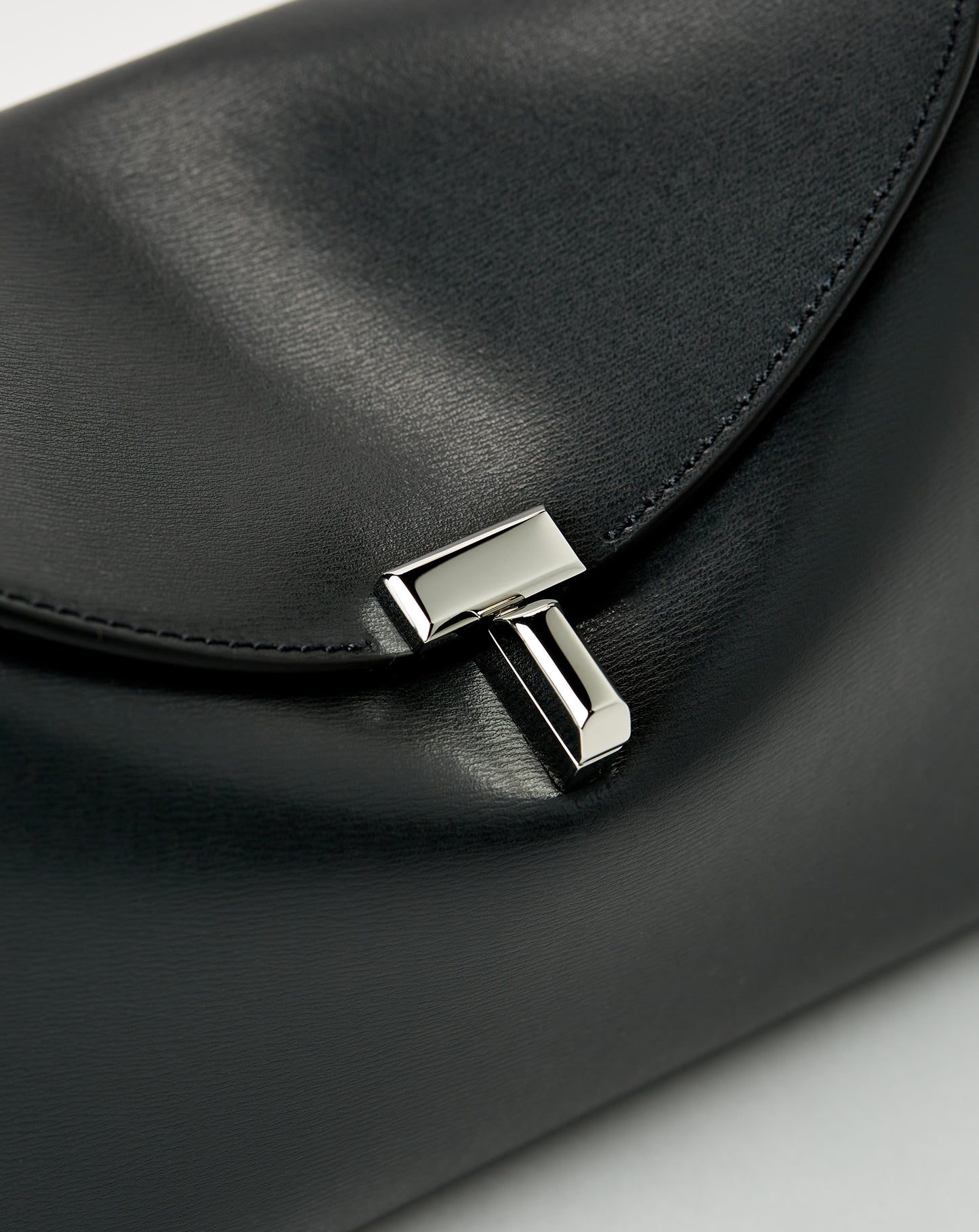 T-Lock Leather Clutch