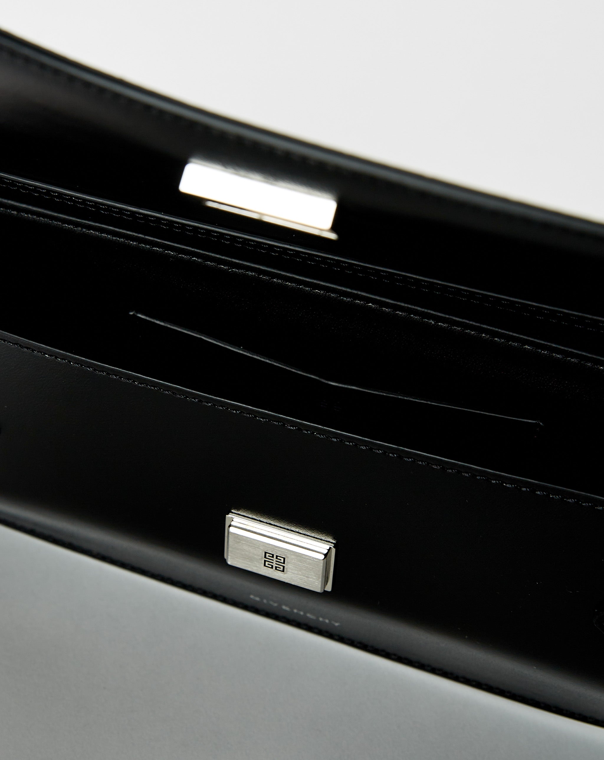 Voyou Clutch Bag