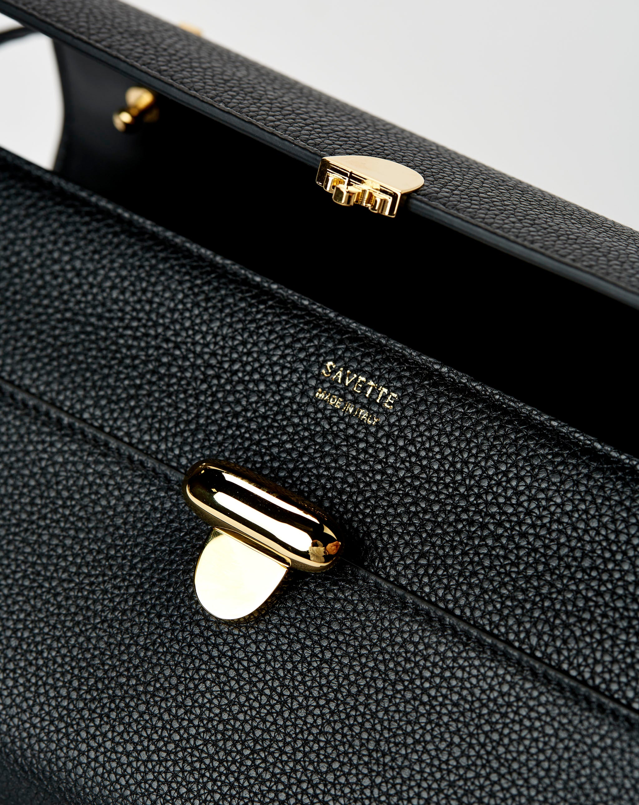 Symmetry 26 in Black Grained Leather