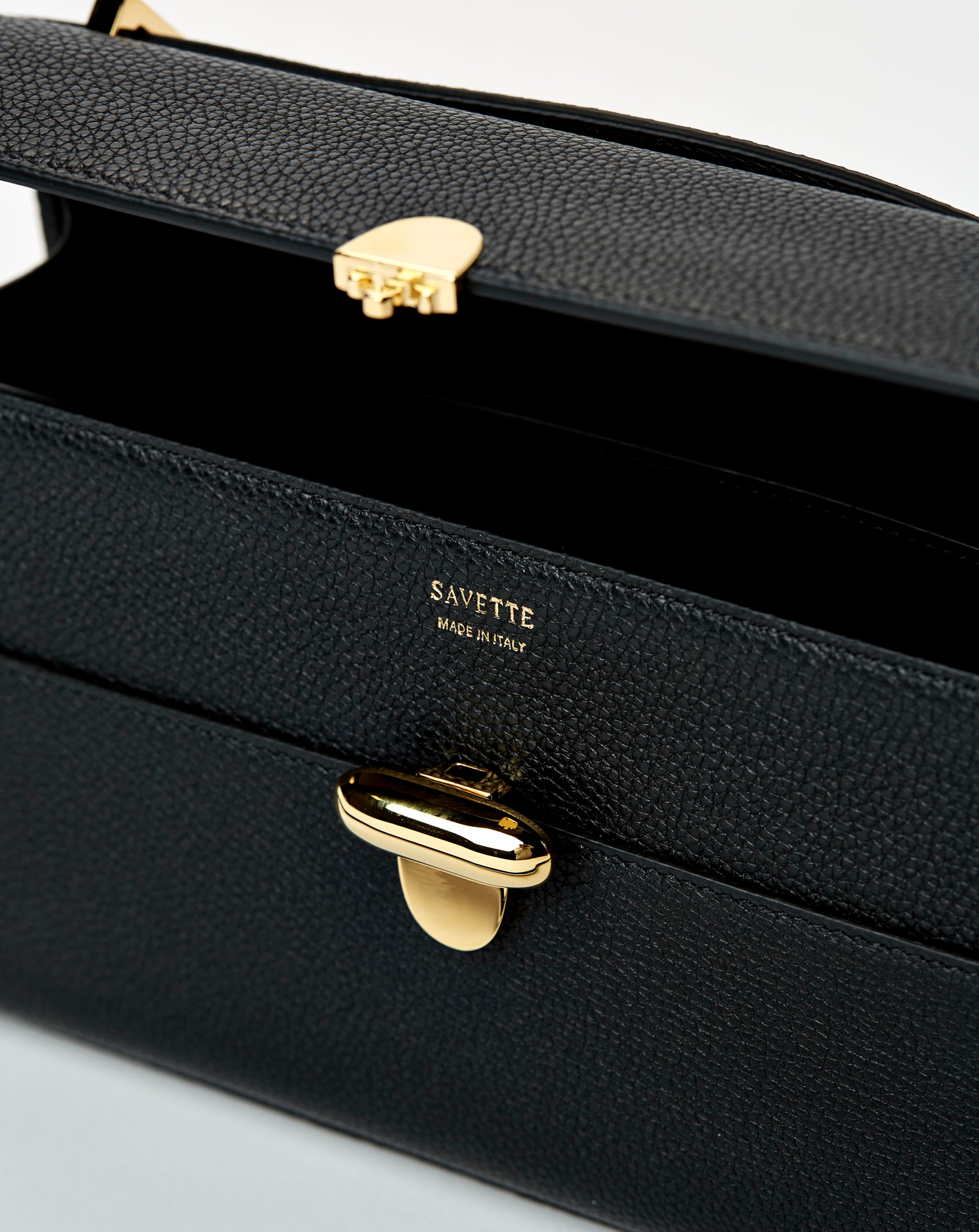 Symmetry 26 in Black Grained Leather